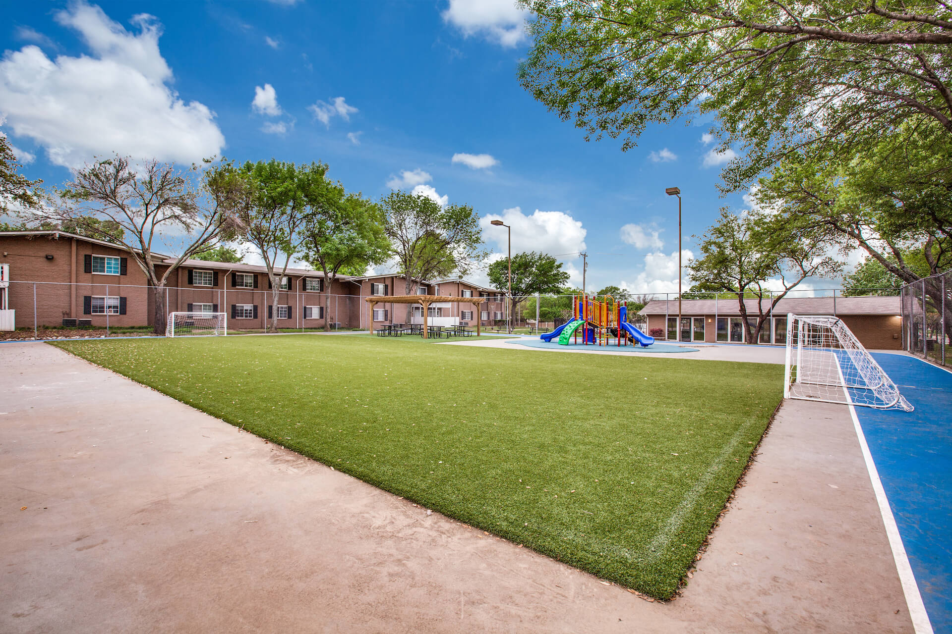 centralized sports court and children's play structure